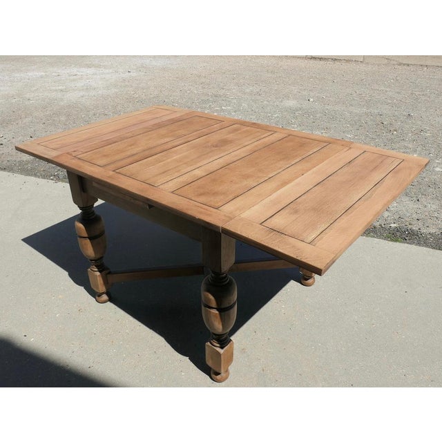 Golden Oak Cottage Draw Leaf Table This is a small size piece of beautiful bleached oak, the square table stands on...