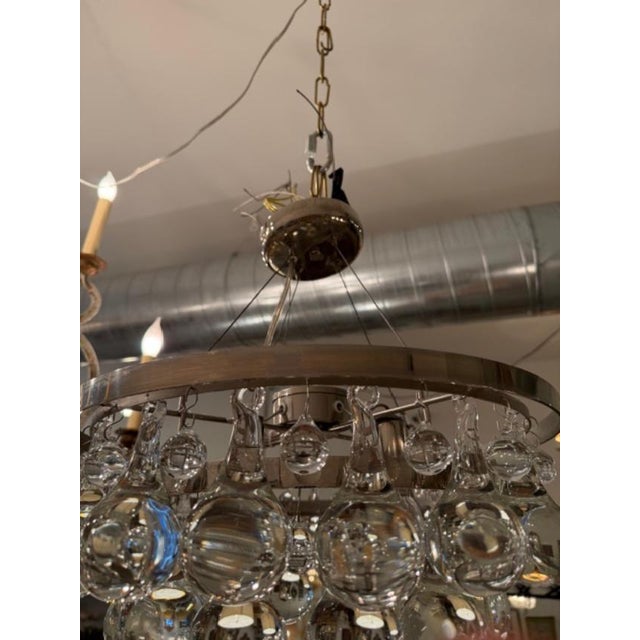 This is an Ochre Pear chandelier with 4 candelabrum bulbs in polished nickel. These fixtures retail for over 5500. The...