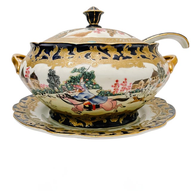 A beautifully decorated Chinese covered tureen with underplate and serving ladle featuring an European hunting scene. Dark...