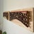A pair of c.1920 Chinese giltwood carved arch panels, each mounted on its own solid wood backplate with a 2 cm floating...