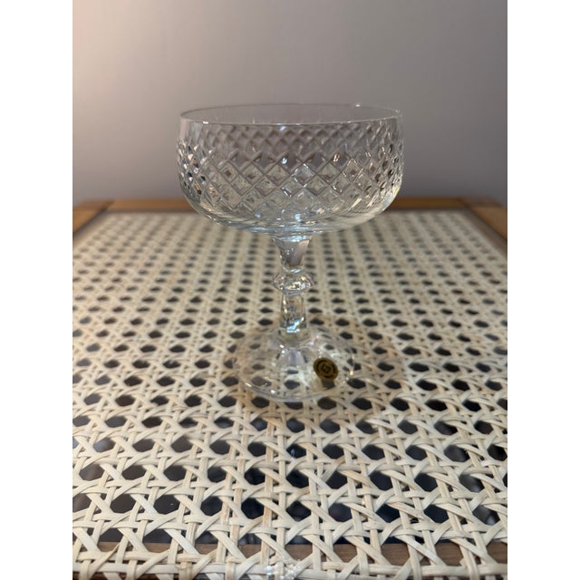 Cut glass, particularly crystal, has a long history of craftsmanship, with significant periods of innovation and...