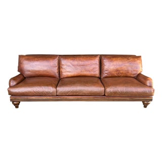 1970s English Traditional Light Brown Leather Sofa With Nail Head Trim & Carved 6-Leg Base For Sale