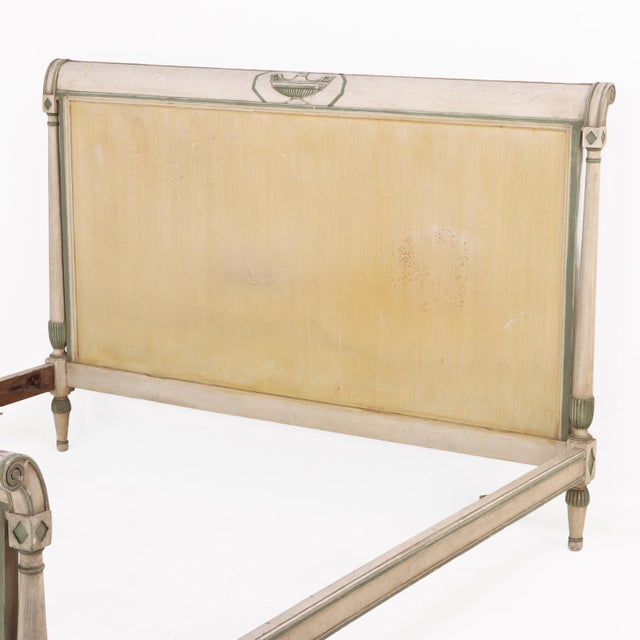 A handsome French Directoire style bed crafted in carved beech and retaining its original painted finish. The rectangular...