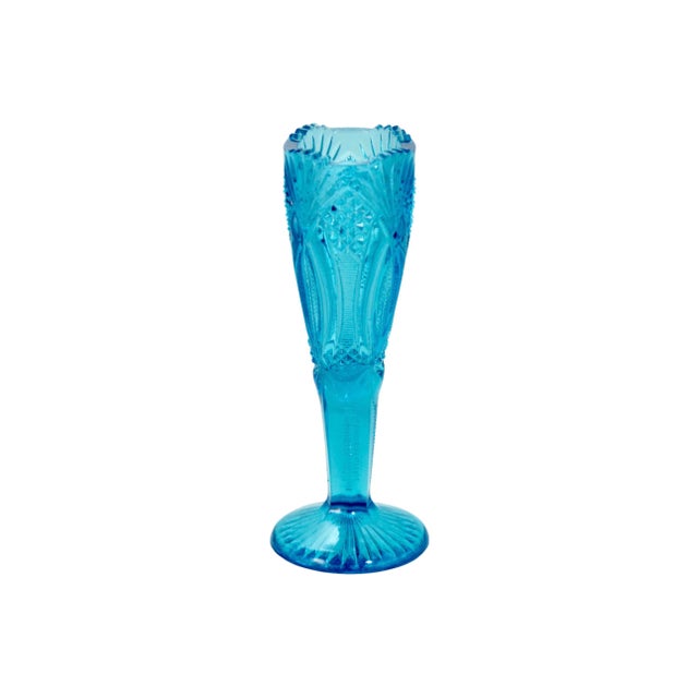 Vibrant teal blue EAPG (Early American Pressed Glass) vase with an intricate diamond, flute and fan design and sawtooth...