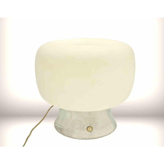 Original space age lamp, from 1970s. Working lamp with Tin base and glass head. Measures: 36x35 cm. Up to 250V (Europe/UK...