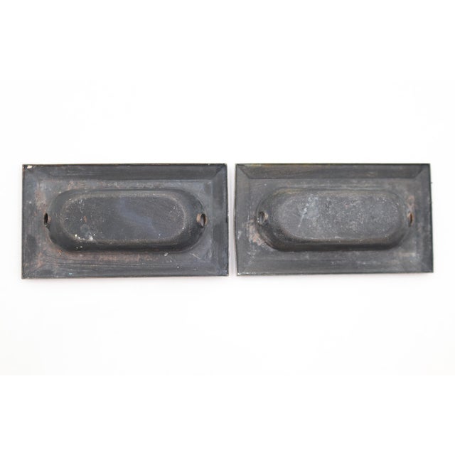 Classic style steel rectangular recessed window sash lifts. The original mounting screws are not available. Good condition...