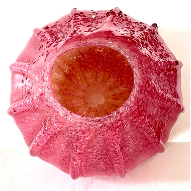 Whether sitting in a window to catch the suns rays or a vessel for your garden flowers this lovely art glass vase makes...