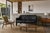 An exceptional early example of the iconic “CAB 415” settee designed by legendary Italian architect and furniture designer...