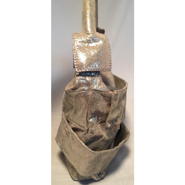 Fendi Gold Leather Straps Small Shoulder Bag in excellent condition. Strips of gold leather cover exterior over gold...