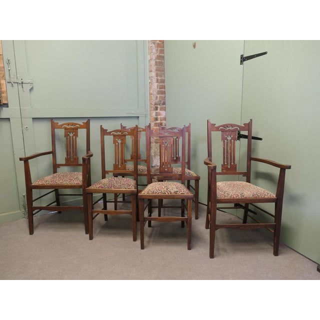 Set of 6 Arts and Crafts Golden Oak Dining Chairs This is a very handsome set of 6 Oak Chairs, 2 Carver chairs and 4...