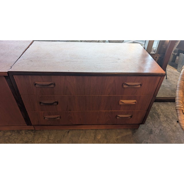 Great set of Danish nightstands . One unit with three drawers the other with cabinet doors. Makers mark pictured