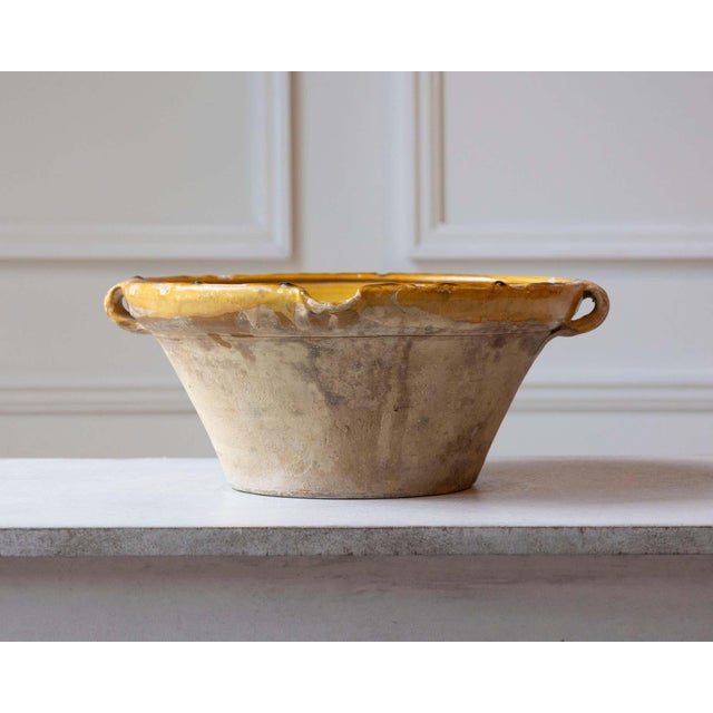 This 19th-century French Tian bowl is a classic example of rustic Provençal pottery, once an essential kitchen vessel in...