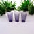 This set of three early 20th century amethyst glass tumblers features etched neoclassical decoration with Grecian-style...
