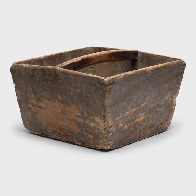 This rustic container was made over a hundred years ago to measure and hold a dou of rice, a traditional Chinese unit of...