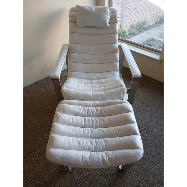 "Pulkka" lounge chair and ottoman designed in 1968 by Ilmari Lappalainen (Asko, Finland, 1918-2006). Aluminium frame,...