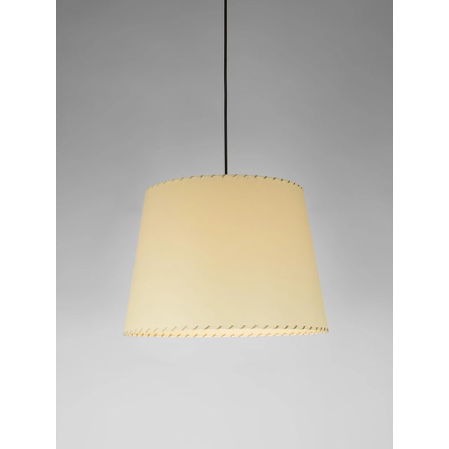 Beige sísísí cónicas gt1 pendant lamp by santa & cole dimensions: d 45 x h 32 cm materials: metal, stitched parchment....