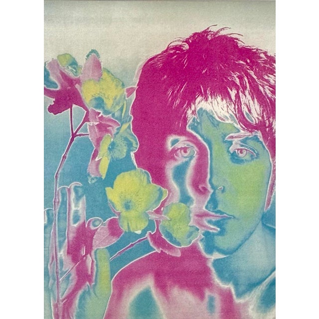 Avedon utilized solarized prints and Day-Glo color overlays to give each band member distinct, symbolic attributes. The...