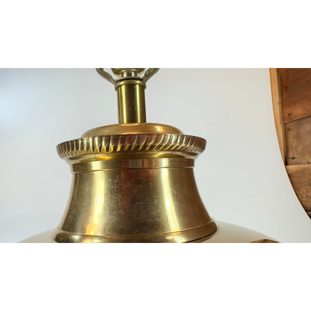 This is a brass Hollywood Regency style Fredrick cooper table lamp in the Chinese manner. It has the original finish and...