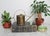 Vintage brass watering can. Made in England. Makers mark on bottom. Patina.