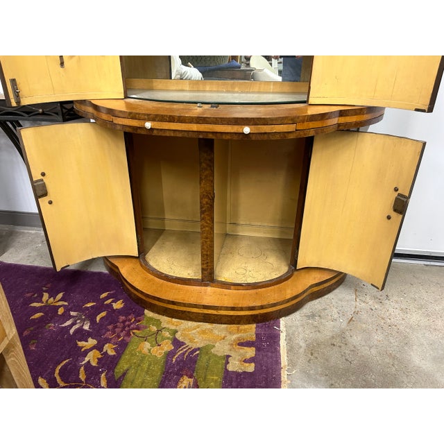 Italian Art Deco Bar. This handsome Italian deco dry bar in mixed woods has two parts resting on a plinth. The upper...