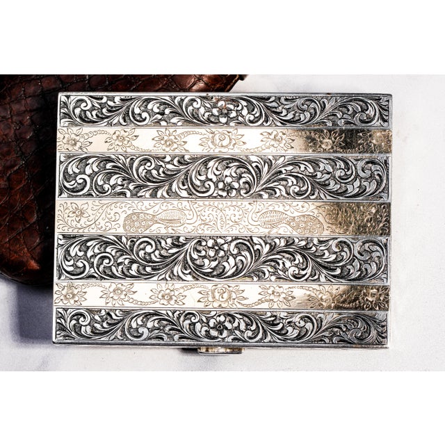 A superb example of Italian silversmithing from the 1920s, this elegant cigarette case showcases the remarkable artistry...