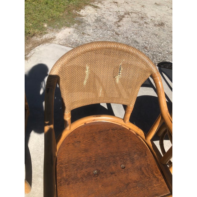 Distinctive Rattan Furniture Clark Casual Furniture, Inc. Boho Rattan Swivel Dining Chairs Set