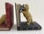Vintage pair of golden retriever bookends with a realistic figural design. Made of heavy resin with a warm, aged finish...