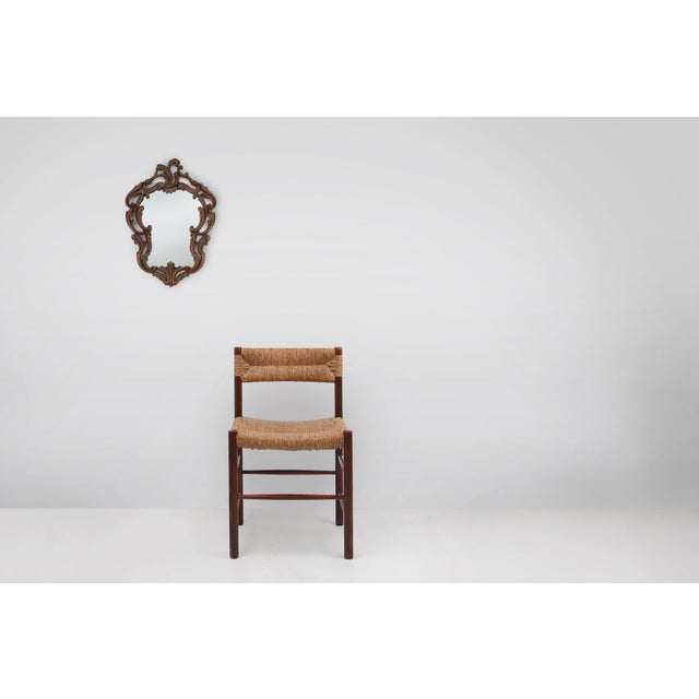 This French mid‑century mirror from the 1950s beautifully reinterprets the opulence of the Baroque tradition through...
