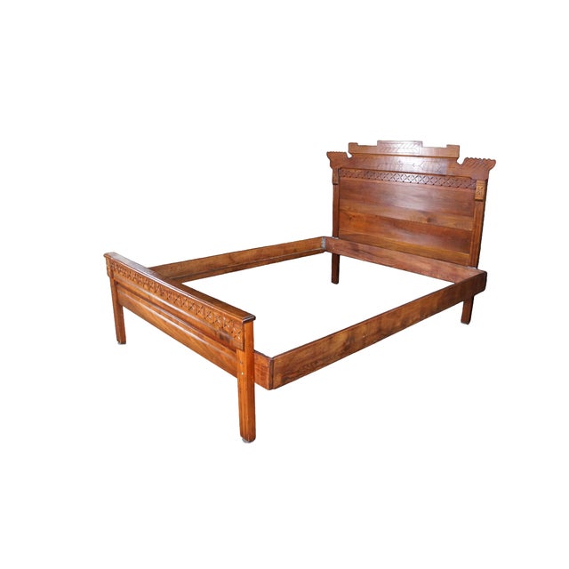 This antique Eastlake movement bed frame is expertly crafted from solid oak, showcasing a beautiful, prominent wood grain...