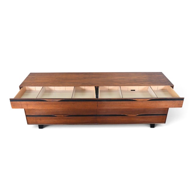 This low eight-drawer dresser was designed by John Kapel and produced by Glenn of California in the USA during the 1960s....