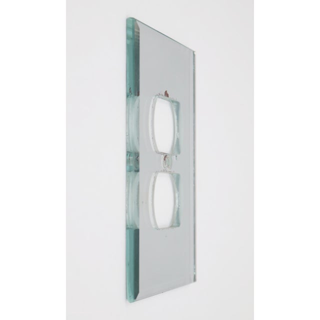 Newly made mirror single duplex outlet switch wall plate cover with a beveled edge. The original mounting screws are not...