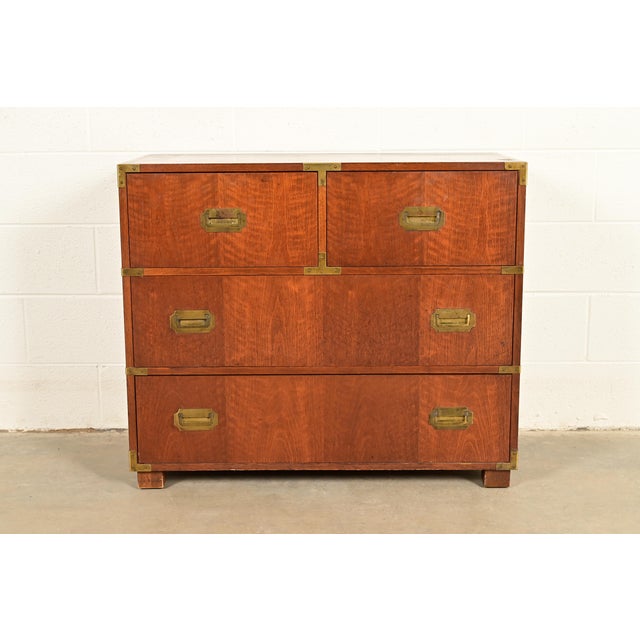 A stunning mid-century modern Hollywood Regency Campaign style four-drawer dresser or chest of drawers By Michael Taylor...