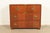 A stunning mid-century modern Hollywood Regency Campaign style four-drawer dresser or chest of drawers By Michael Taylor...