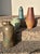 A striking, handcrafted stoneware vase from the GDR, featuring finely crafted incised and chip-carved decoration. The...