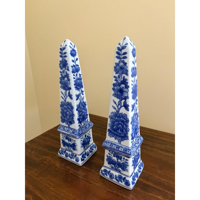 A stunning pair of neoclassical, Chinoiserie, or Grand Tour style blue and white porcelain obelisks Measures: 3.75"W x...