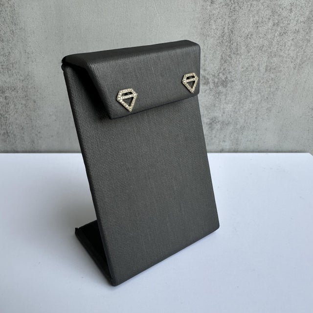 Add a touch of geometric elegance to your jewelry collection with these 14kt Yellow Gold Diamond-Shaped Earrings,...