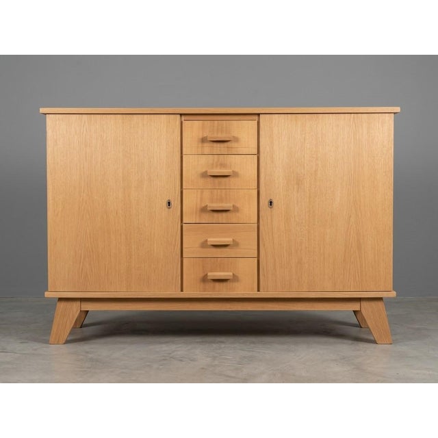 Mid-Century French Modern Model 130 Sideboard by René Gabriel, 1950s, in Very Good conditions. Designed 1920 to 1949 This...