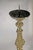 A beautiful brass candleholder suitable for larger candles as the holder itself is also a sizable piece.