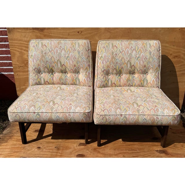 These elegant chairs feature the clean, architectural lines and understated luxury for which Wormley is celebrated. The...