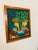 Haitian Jungle Scene Painting – Naïve Style This vibrant Haitian painting bursts with life and detail, capturing a lush...