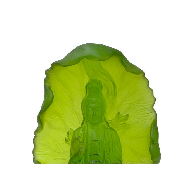 This art glass sculpture depicts Guanyin, the Bodhisattva of Compassion, seated in a posture of serene contemplation. Cast...