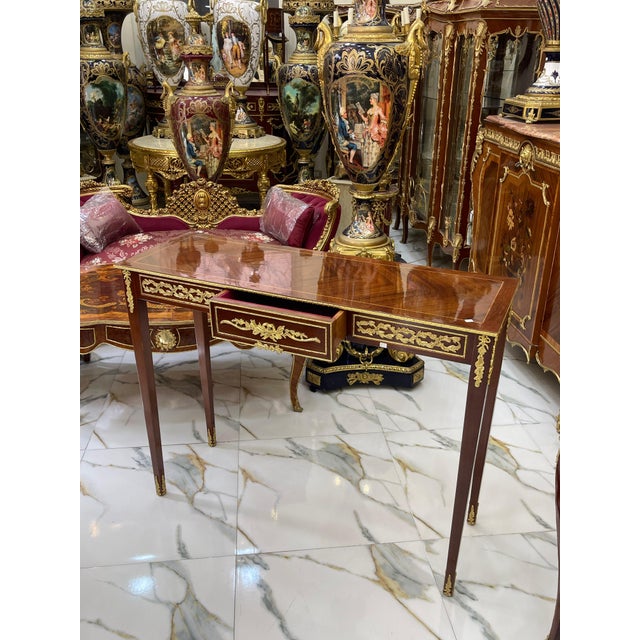 Fall in love with this timeless French-style console table, featuring a classic rectangular silhouette and exquisite...
