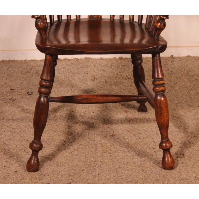 Magnificent 19th-century English Windsor armchair in ash and elm A very beautiful, high-quality armchair with elegant legs...