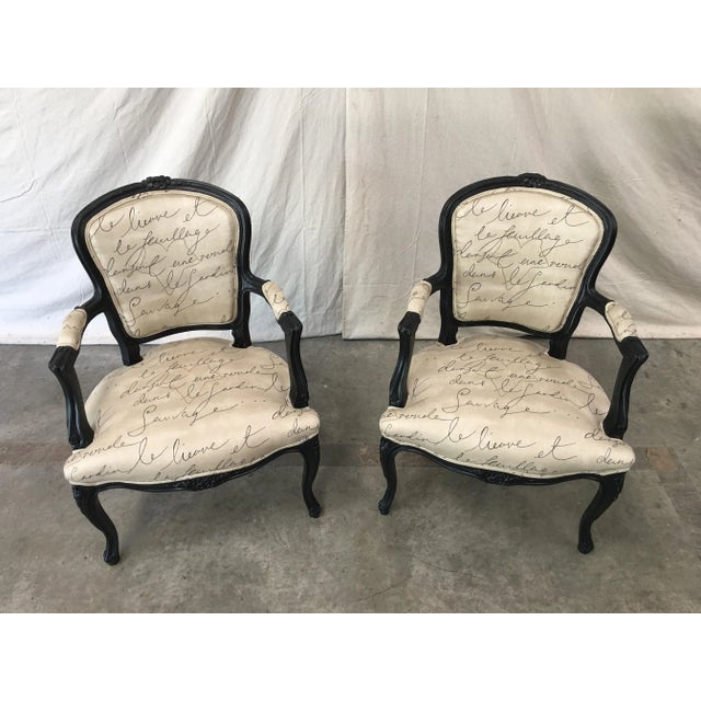 Beautiful pair of 19th c. French Louis XV style arm chairs. This lovely pair of French chairs feature painted walnut...