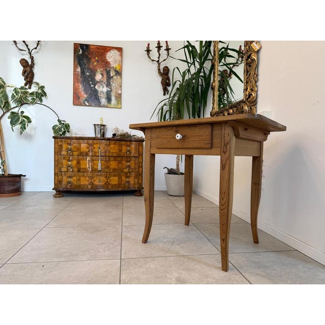 Elegant farmhouse table from Burgenland. Dimensions: Height x Width x Depth 80 x 88 x 64 cm. For sale is a solid spruce...