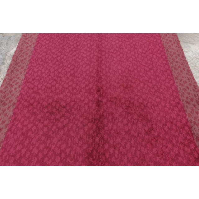 This 5x10 vintage Dutch runner, hand-knotted in wool, circa 1950–1969, presents a restrained geometric layout rendered in...