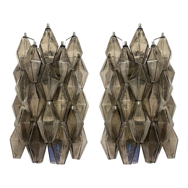 Contemporary and luxury wall sconces with fumè “POLIEDRI” Murano glass in Venini style. Glass elements are blown inside a...