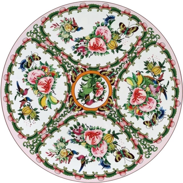 This elegant set of 4 bone china charger plates brings the timeless beauty of Famille Rose porcelain to your table....