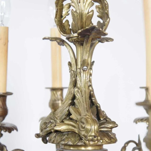 DETAILS This antique, compact French chandelier was artistically conceived with many decorative elements. It features...