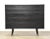 A mid century modern seven drawer dresser professionally refinished in an ebonized black finish designed by Edward Wormley...